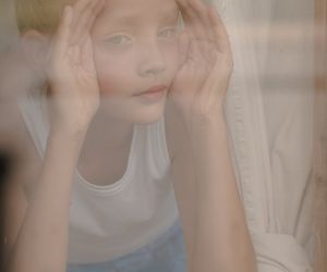 Soft natural light coming through white curtains.